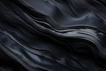 Obsidian. Black lava texture background. Obsidian texture. cut and polished obsidian. raw obsidian
