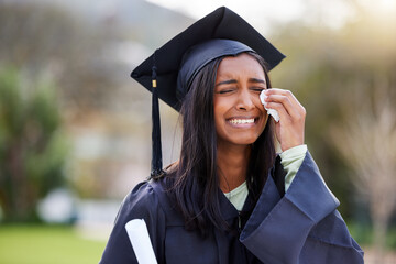 Graduation, crying and woman with achievement, emotion and tissue for university education. School,...
