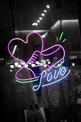 sneaker neon sign that says love