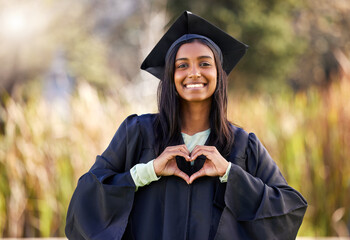 Graduation, portrait and woman with heart hand sign, smile and emoji for university education....