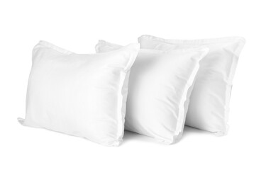 Many new soft pillows isolated on white