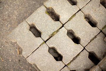 Paving stones lie on a pallet. Construction site, top shot, nobody. 

