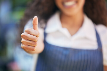 Girl, florist and thumbs up in outdoor for success of startup, small business and growth of nursery for sustainable retail. Woman, entrepreneur and hand gesture for yes with floral studio for flowers