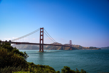 The Golden Gate Bridge spanning across San Francisco Bay on a Summer Day