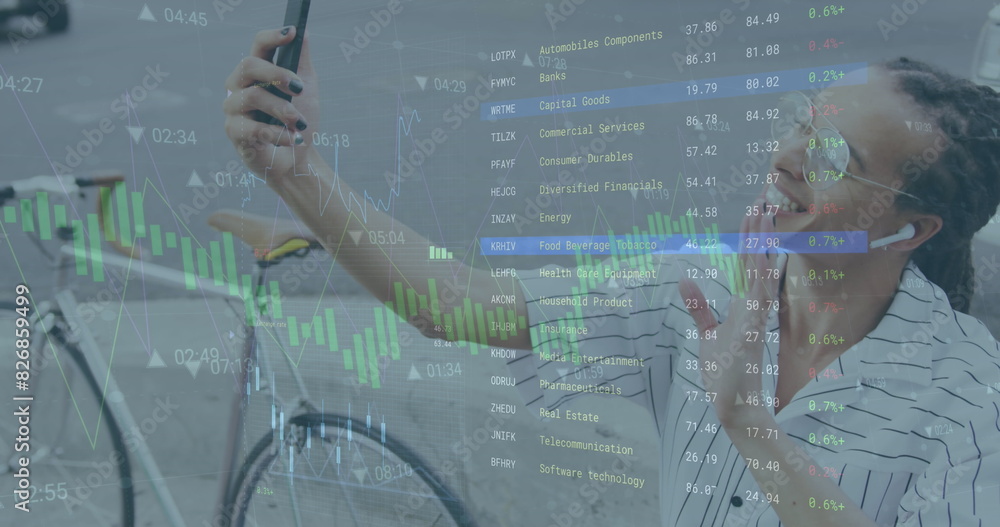 Poster image of graphs and trading board over biracial ma vlogging on cellphone