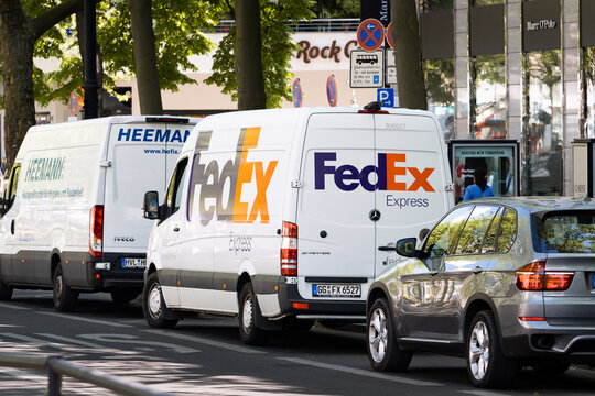 BERLIN, GERMANY - 30. April 2024: FedEx delivery van standing on the street in central Berlin. The American logistics and transportation company is a multinational employer also in Europe.