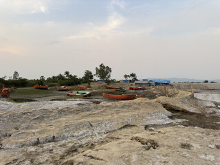 Colourful boats at low tide, Chittagong, Bangladesh