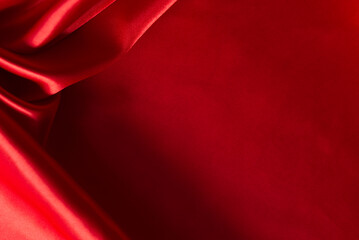 The bright red silk satin surface is beautiful and luxurious, wavy. For background and graphic work...