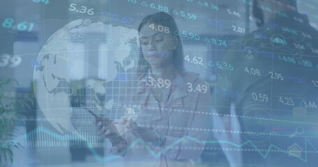 Image of stock market data processing and globe over diverse man and woman discussing at office