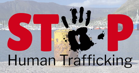 Image of stop human trafficking text over cityscape