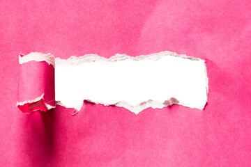 The hole from pink paper was torn. Decoration and texture