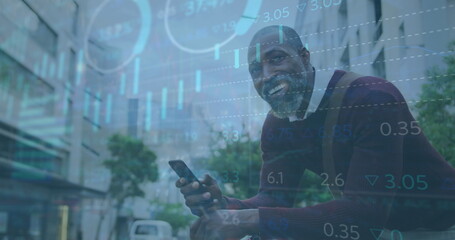 Image of data processing over african american businessman using smartphone