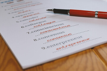 English misspelling worksheet with pen and tablet
