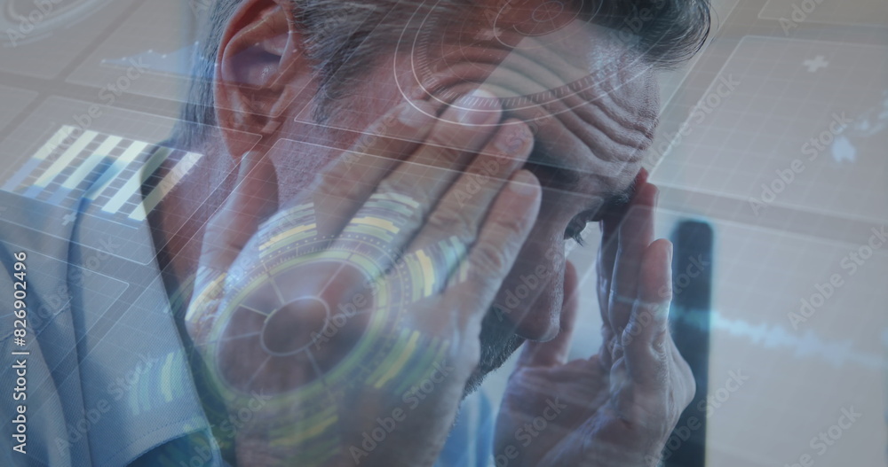 Poster image of interface with data processing against close up of a caucasian senior man at office