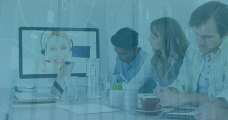 Image of data processing over diverse colleagues having a image conference in meeting room