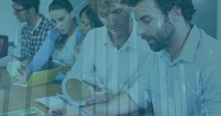 Image of statistical data processing over two diverse men discussing over documents at office