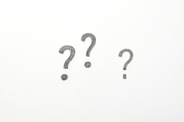 Hand-Drawn Question Marks on White Background