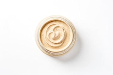 Close Up of Beige Cream in Glass Jar