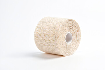 A roll of beige elastic bandage on a white background. The bandage is made of a soft, flexible material and is designed to provide support and compression to injured areas.