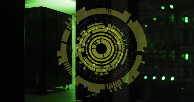 Image of multiple round scanners spinning against computer server room