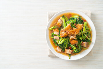 Stir-fried kale vegetable with crispy pork
