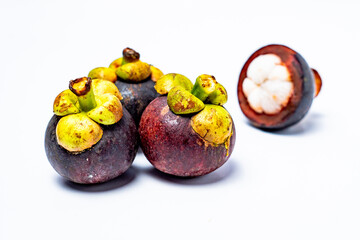 Mangosteen fruit isolated on white background. Mangosteen is known as a fruit that has very high levels of antioxidants. Garcinia mangostana