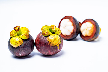 Mangosteen fruit isolated on white background. Mangosteen is known as a fruit that has very high levels of antioxidants. Garcinia mangostana
