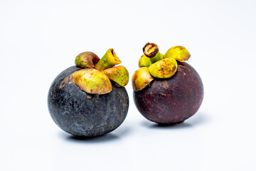 Mangosteen fruit isolated on white background. Mangosteen is known as a fruit that has very high levels of antioxidants. Garcinia mangostana