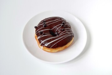 Tasty donut with chocolate glaze 