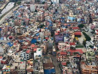 Kathmandu, Nepal from the air showing urban density and an array of colours.
