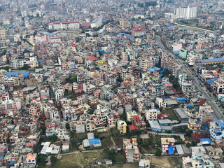 Kathmandu, Nepal from the air showing urban density and an array of colours.