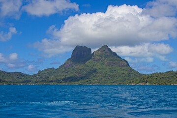 Bora Bora's extinct volcanoes rise above its beautiful lagoon