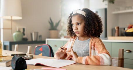 Little girl, thinking and counting with book in kitchen for mathematics, homework or assessment at...