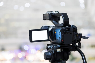 Video camera with blur background for journalist interview broadcasting reporter news or press...