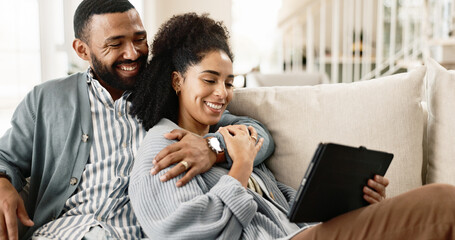Couple, love and internet on couch with tablet on streaming application for home entertainment,...