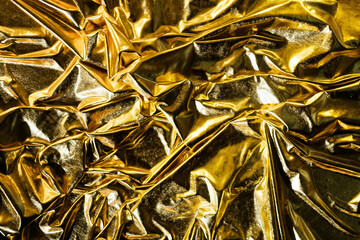 Gold bronze glitter. Gold texture.  Beatiful luxury and elegant gold background. Shiny golden wall texture. Golden background. 