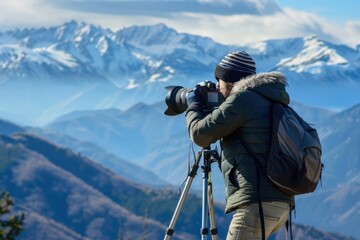 Photographer capturing mountain landscape