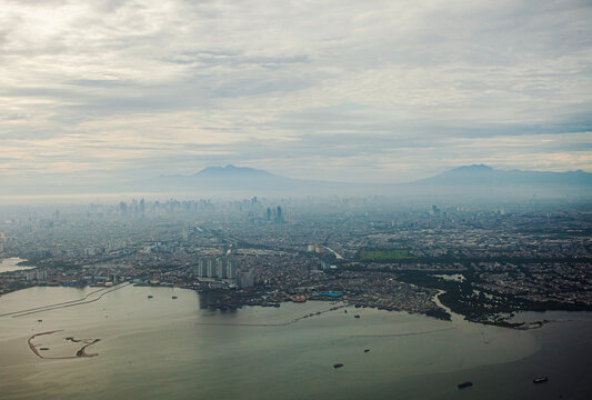 The North Coast area of ​​Jakarta City seen from a height. This area has developed into a central business and residential area in North Jakarta, Indonesia.