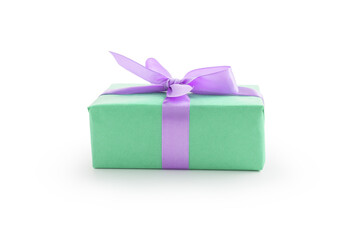 Green paper present box with violet ribbon bow isolated on white background