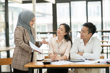 Asia business meeting   consultations of business people in the company's meeting room. 