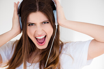 Girl, portrait and headphones for music, singing and listening with cheerful, enjoying and...
