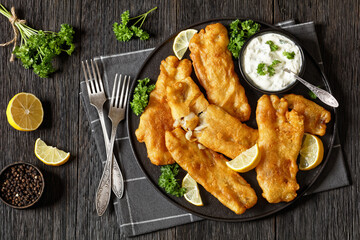 deep fried crispy beer batter fish fillet on plate