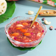Nutritious breakfast made of dried lotus root powder and whole grains, indoor white background, nutritious porridge and healthy food