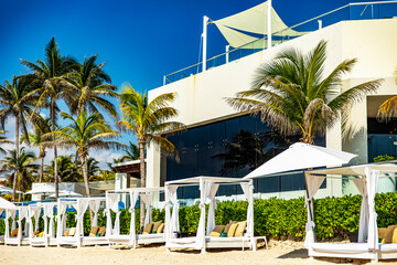 Great resort hotel with Balinese beds on a white sand beach and crystal clear turquoise water...