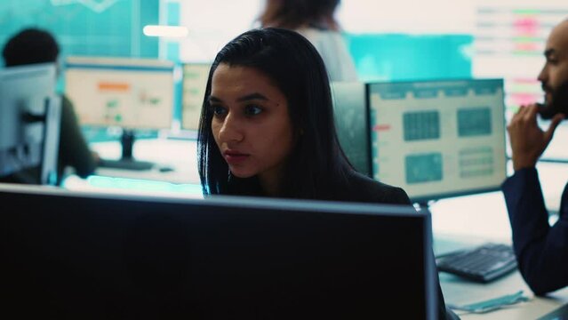 Indian office administrator explores partnership opportunities for the global business expansion plans, establishing current enterprise objectives. Analyst doing a win or loss study. Camera A.