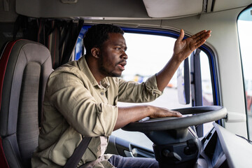 Nervous truck driver yelling while driving.