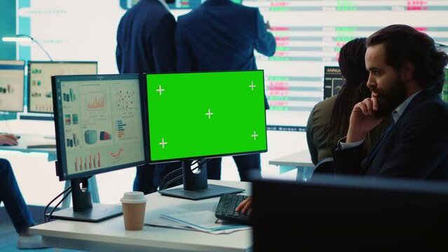 General director reads insight about a new expansion strategy on pc, mockup screen in enterprise office. Analyst presenting reports and infographics to analyze business activity status. Camera A.