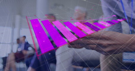 Image of arrow on falling graph over midsection of caucasian man using smartphone