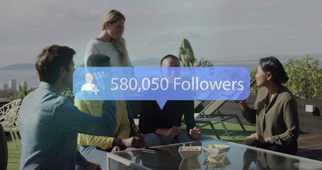 Image of notification bars over diverse friends discussing while drinking beer