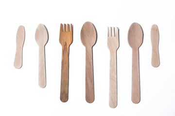 Wooden spoon and fork isolated on white background